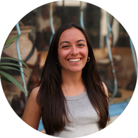 Portrait of a smiling woman. Perfect guide for Amsterdam trips.